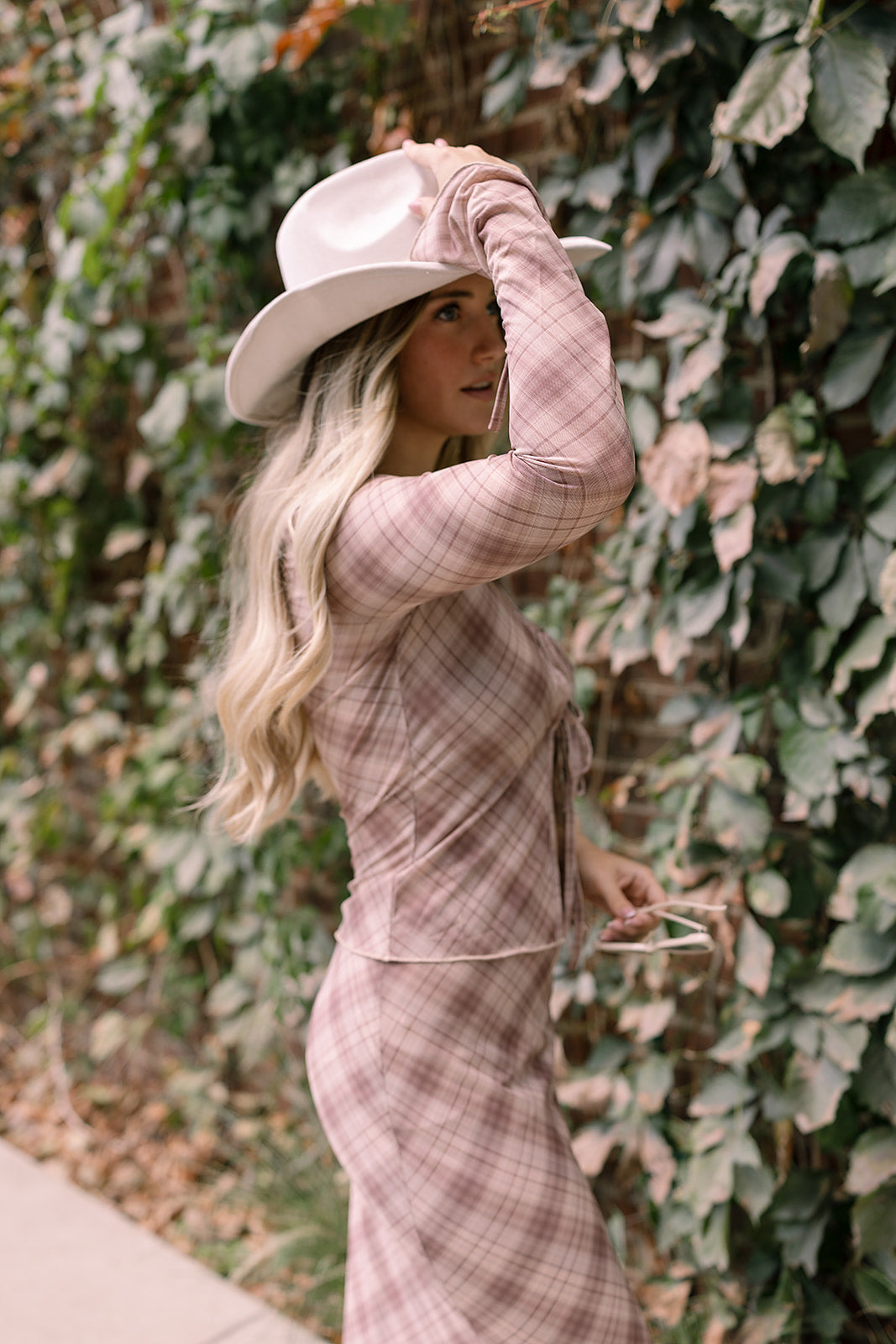 Model wearing a Muted Plaid Tie Top &  Midi Skirt with Western Hat, Kittenish Nashville