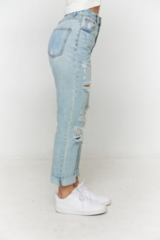 DISTRESSED DENIM JEANS