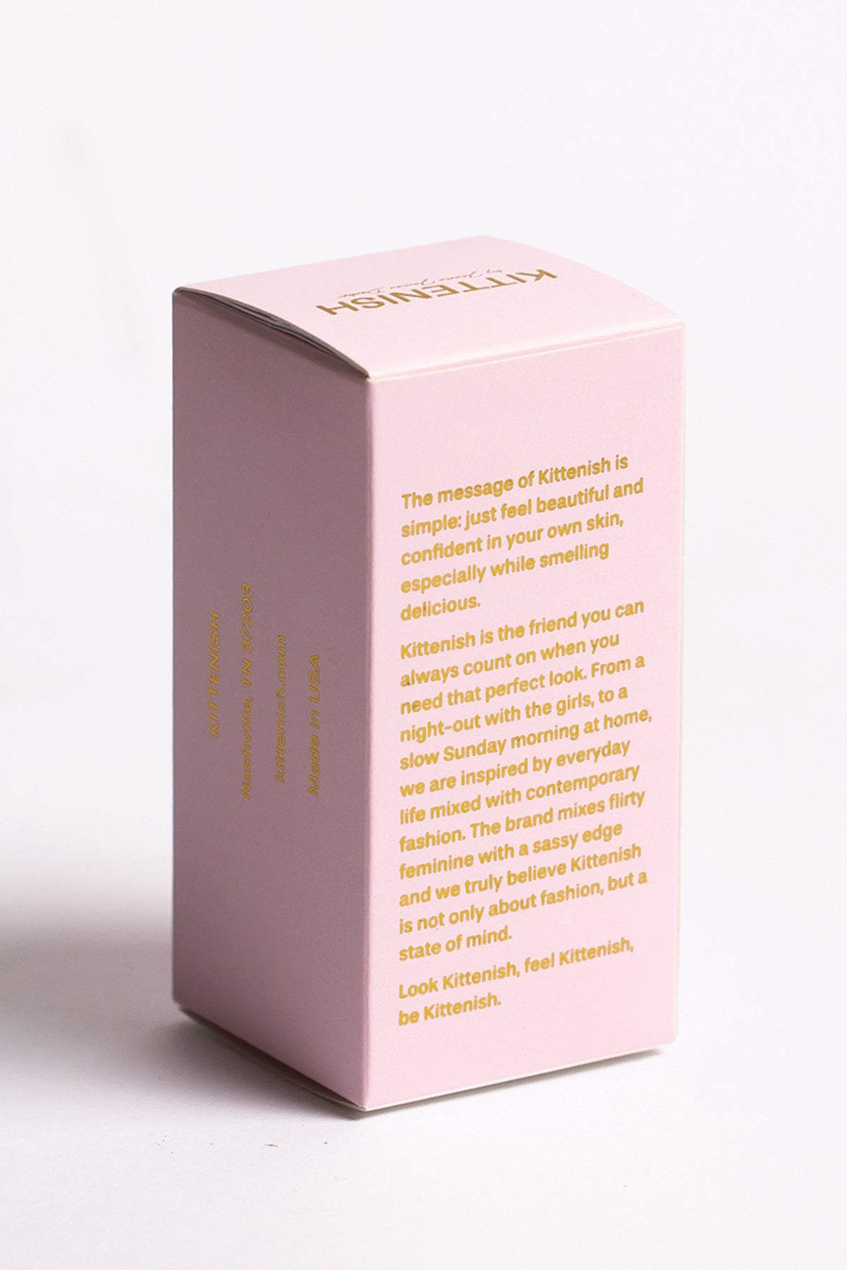 Kittenish perfume box on white background