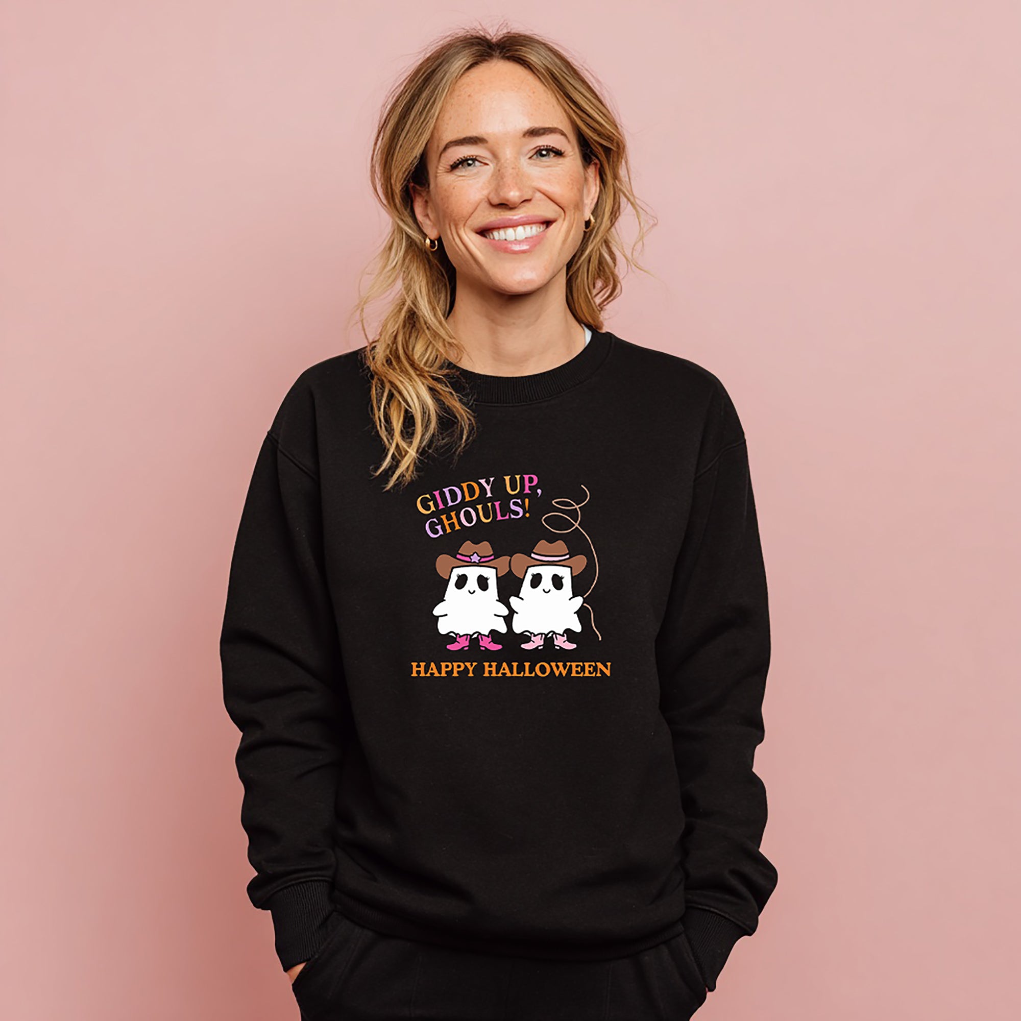 Model wearing "Giddy up, ghouls! Happy Halloween" black sweatshirt, from Things Remembered x Kittenish by Jessie James Decker 