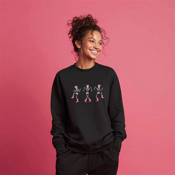 Model wearing black dancing skeletons sweatshirt, from Things Remembered x Kittenish by Jessie James Decker 