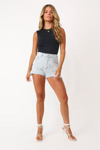 Model wearing the Black Signature Sleeveless Bodysuit. 