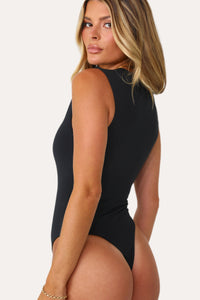 Model wearing the Black Signature Sleeveless Bodysuit. 