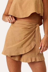 Model wearing the Home Town Tan Wrap Skort.