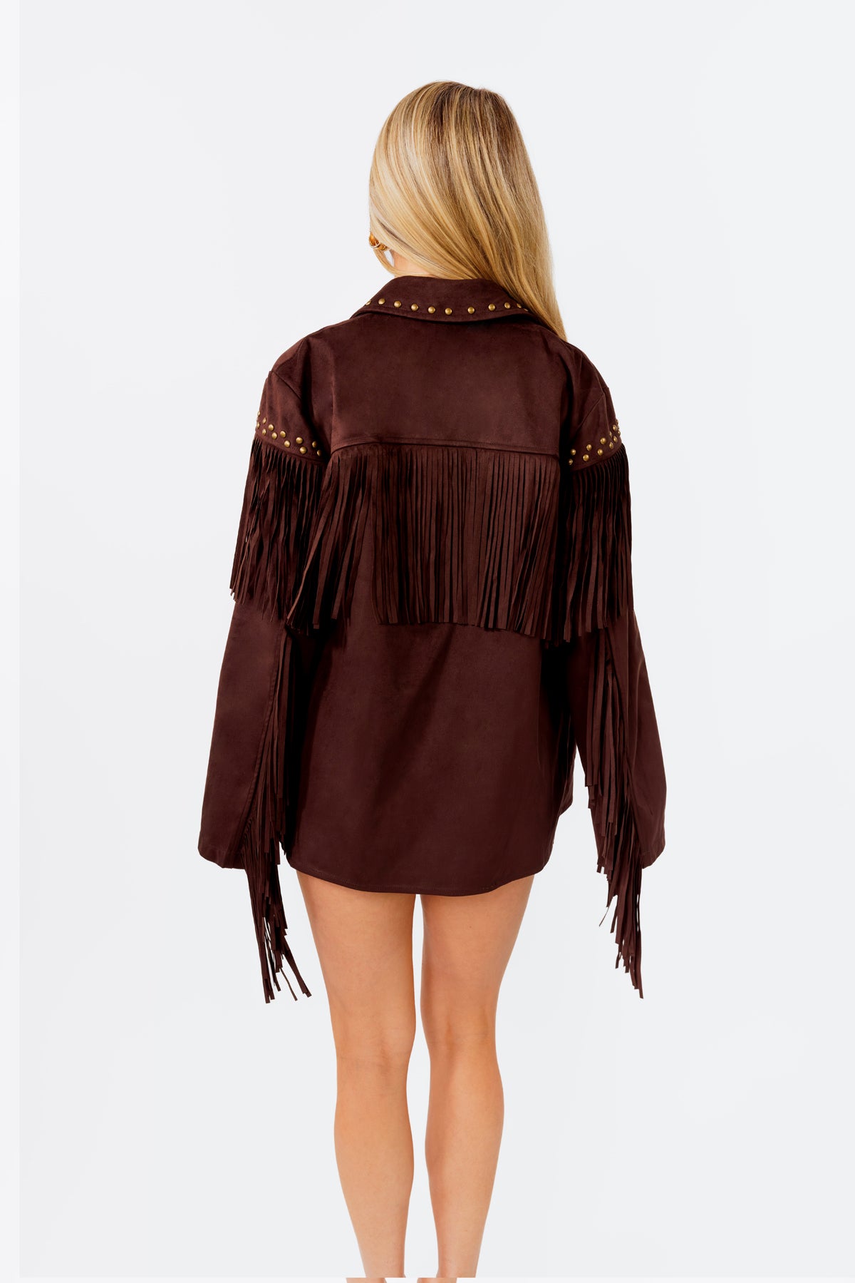 Brown fringed jacket worn by a person on a white background