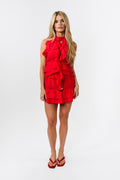 Woman wearing a red set on a white background