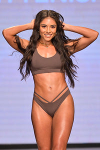 Model Tish Martinez wearing the Palermo Brown Bikini top on the runway at Miami Swim Week