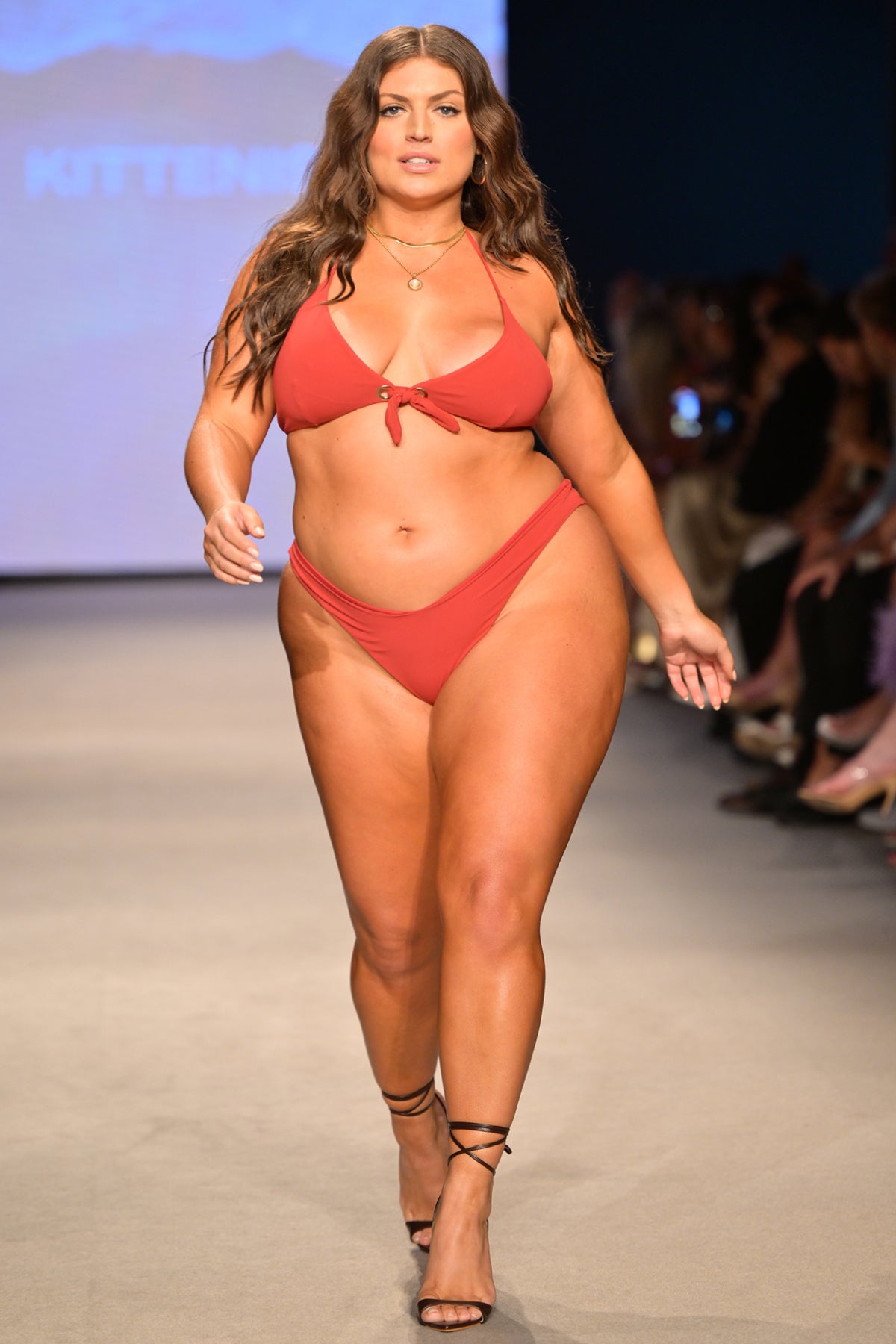 Model Gabriella Halikas wearing the Roma Bikini bottoms on the runway at Miami Swim Week.