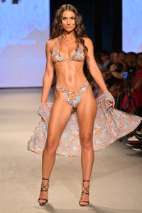 Model Steph Rayner wearing the Mama Mia o-ring bikini bottom on the runway at Miami Swim Week