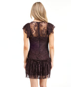 A woman modeling a dark brown lace mini dress with ruffled cap sleeves and tie detail at the neckline, paired with dark brown knee-high boots, against a plain white studio background.