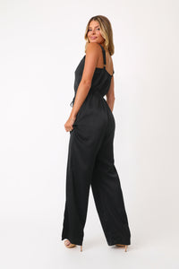 Model wearing the Jess Black Satin Jumpsuit.