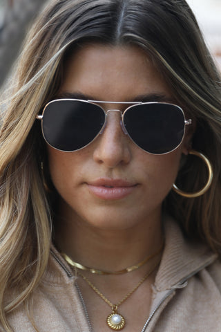 The Sydney classic gold aviator sunglasses.
