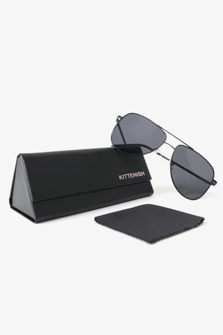 The JJD Classic Aviator black sunglasses, Kittenish case, and cleaning cloth. 