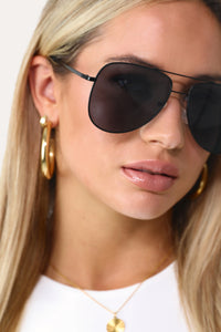 Model wearing the JJD Classic Aviator black sunglasses.