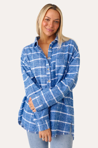MODEL WEARING SNUGGLE UP BLUE PLAID FLANNEL