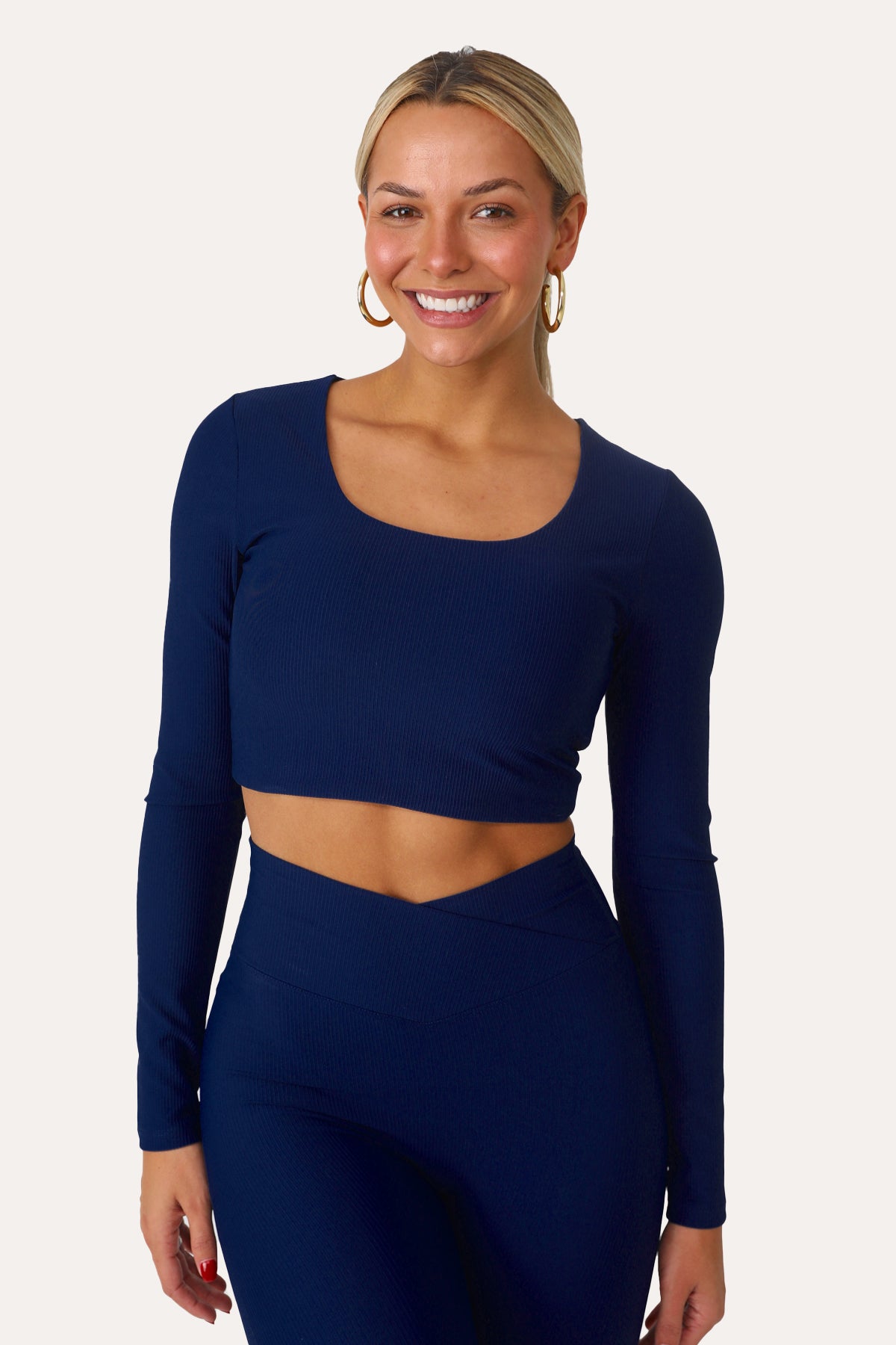 MODEL WEARING KEEP IT COOL BLUE LONG SLEEVE ACTIVE TOP