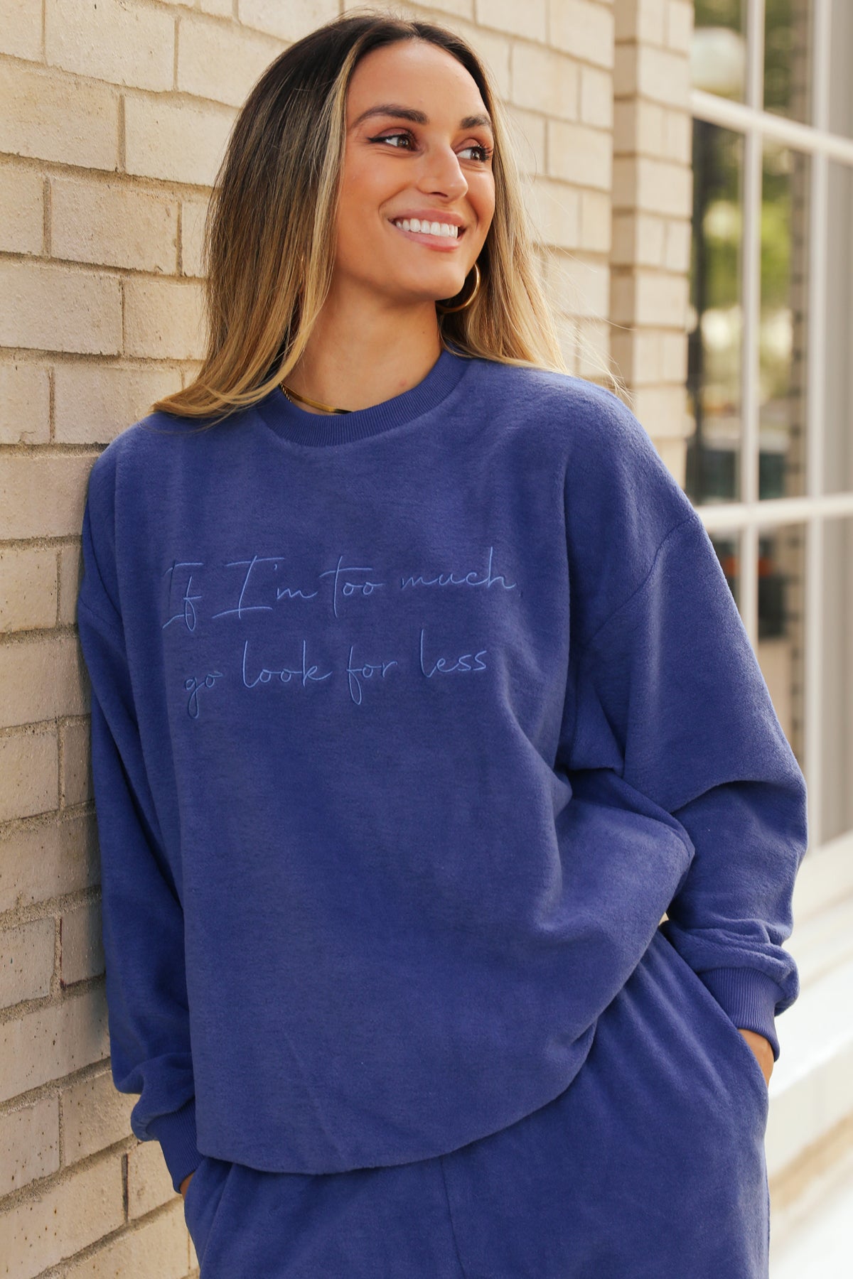 Model wearing the Go Look For Less Sweatshirt