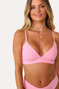 Model wearing the Bubble Gum Pink basics Bralette