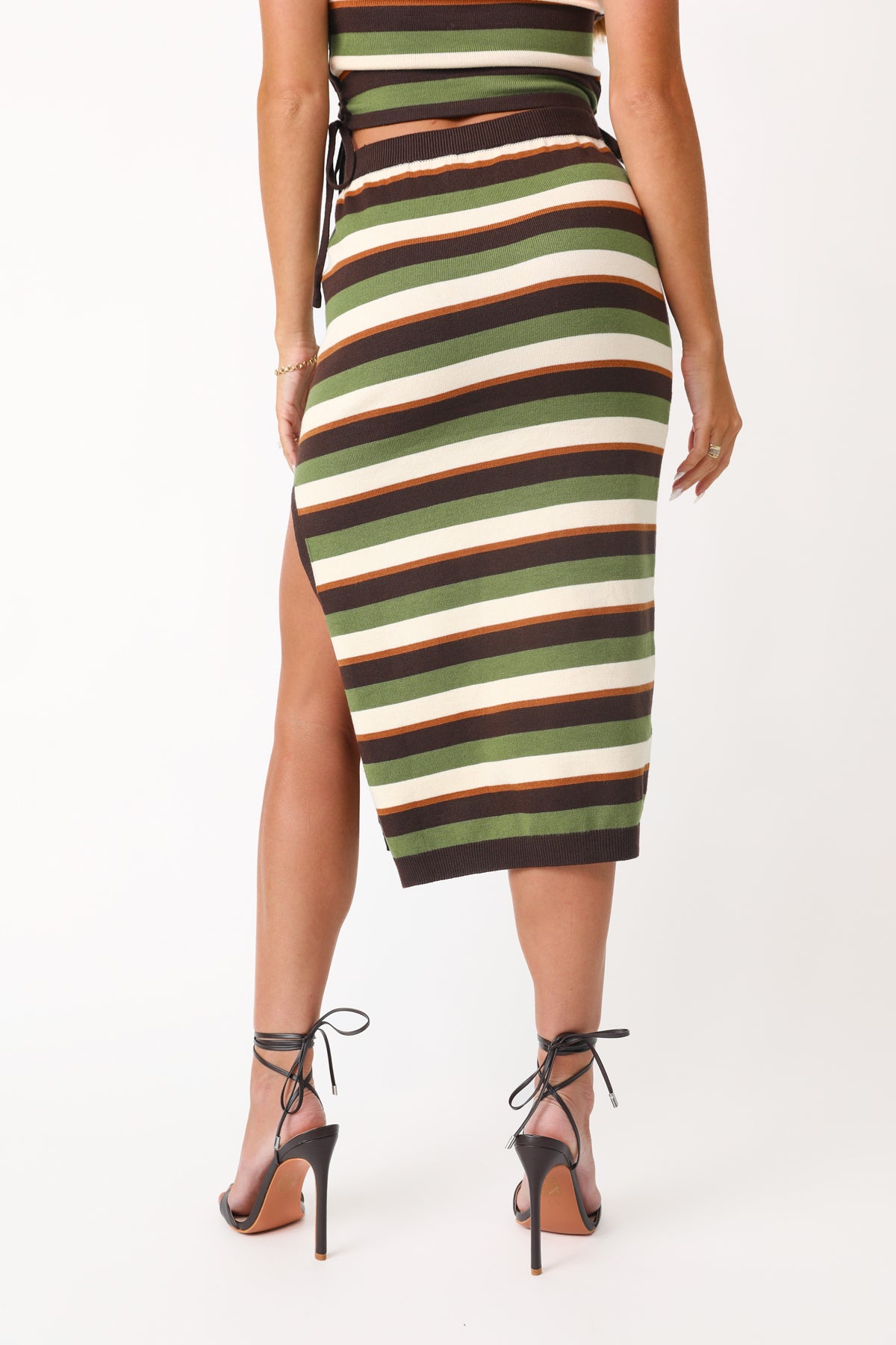 Model wearing the Destination Stripe Knit Midi Skirt.