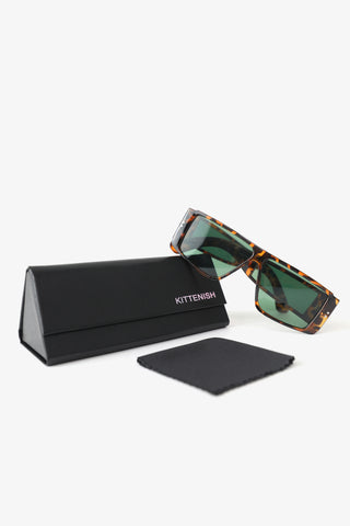 The Junie Tortoise square frame sunglasses, Kittenish case, and cleaning cloth.