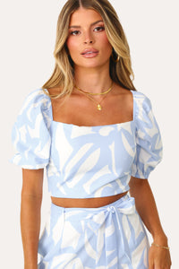 Model wearing the Chasing Waterfalls printed blouse.