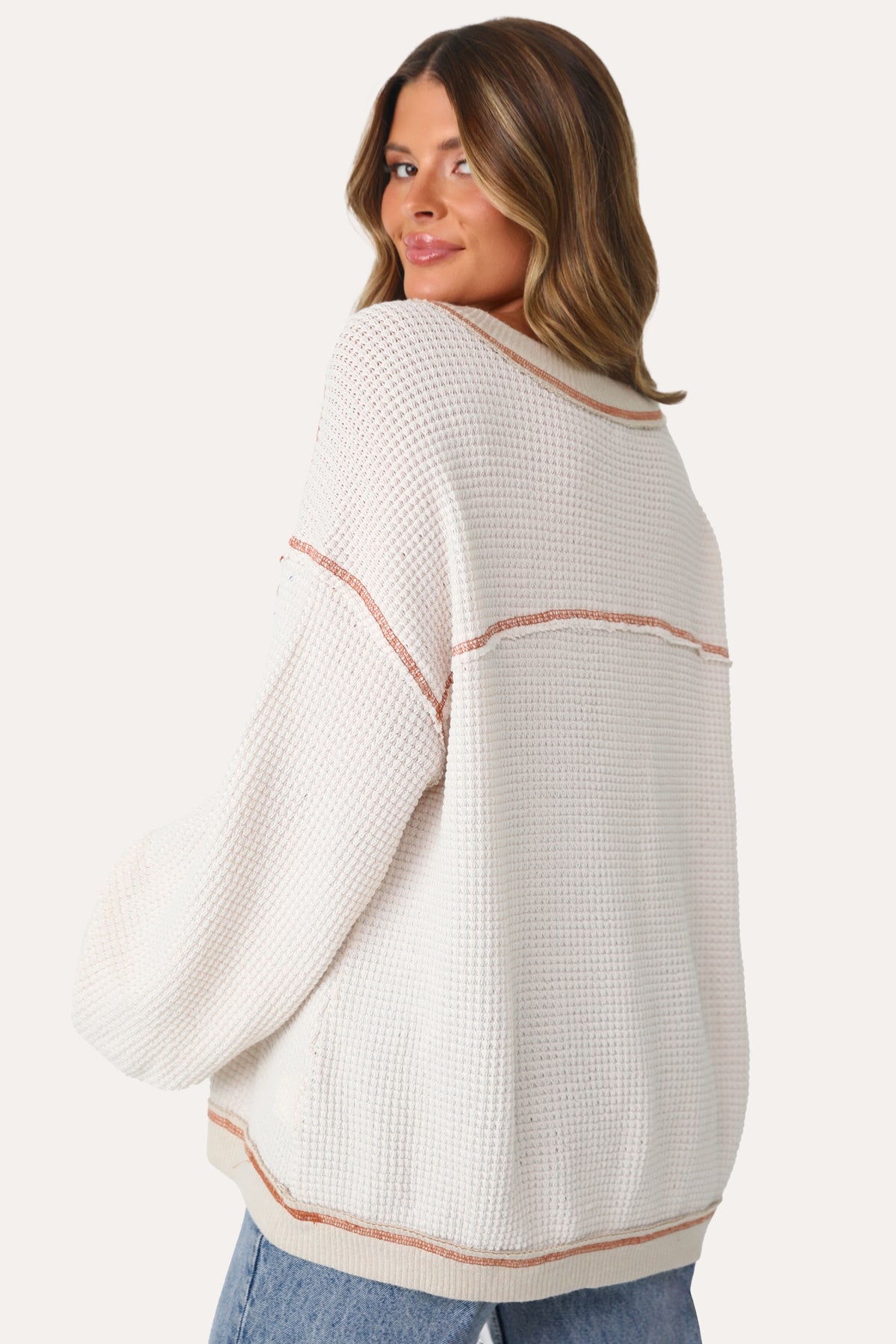 MODEL WEARING ON CLOUD NINE WAFFLE TOP.