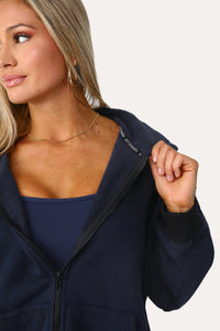Model wearing the Baller Navy blue + black full zip.