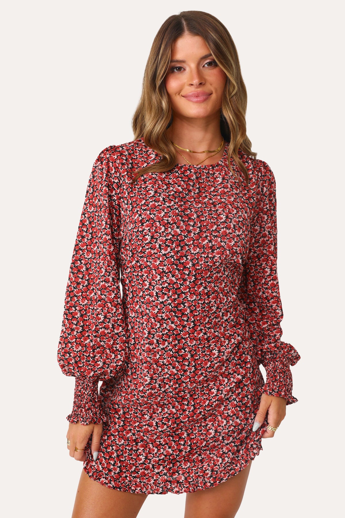 MODEL WEARING THE FOREVER YOURS FLORAL MINI DRESS