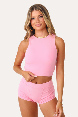 Model wearing the Bubble Gum Pink basics full coverage tank