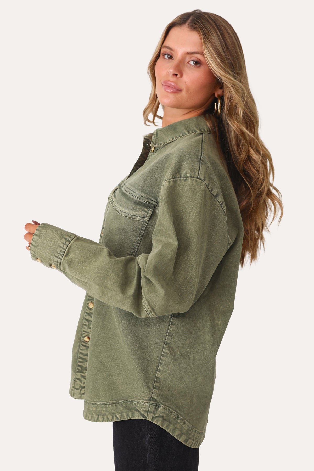 MODEL WEARING THE STEP IT UP GREEN UTILITY SHACKET