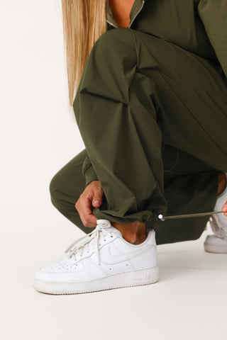 Model wearing the Run Down jogger with bungees.
