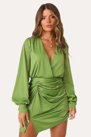 Model wearing Let's Date Green Dress.