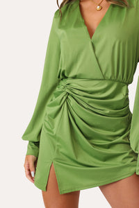 Model wearing Let's Date Green Dress.