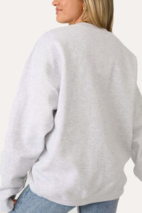 MODEL WEARING THE HEATHER GREY KITTENISH GRAPHIC SWEATSHIRT