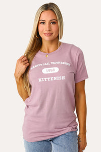 Model wearing Kittenish Logo Graphic Tee in Mauve.