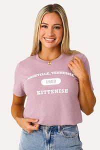 Model wearing Kittenish Logo Graphic Tee in Mauve.