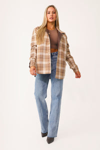 Model wearing the Inside-Out Reversible Faux Leather Shacket.