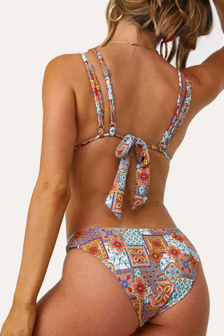 Model wearing the Mama Mia O-Ring printed Bikini Bottom.
