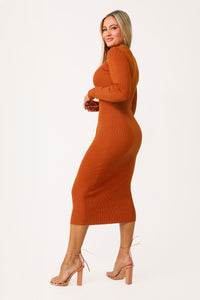 Model wearing the Virgo Long Sleeve Midi Dress.