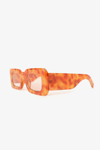 the Regina Phalange orange tortoise sunglasses.