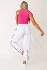 Model wearing the Low Key raspberry basics tank.