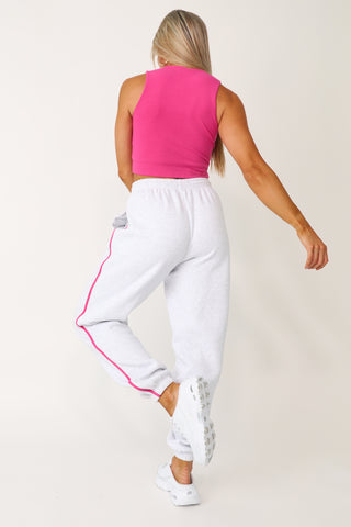 Model wearing the Low Key raspberry basics tank.
