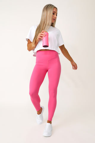 Model wearing the Rookie Crop Shirt with bungees.