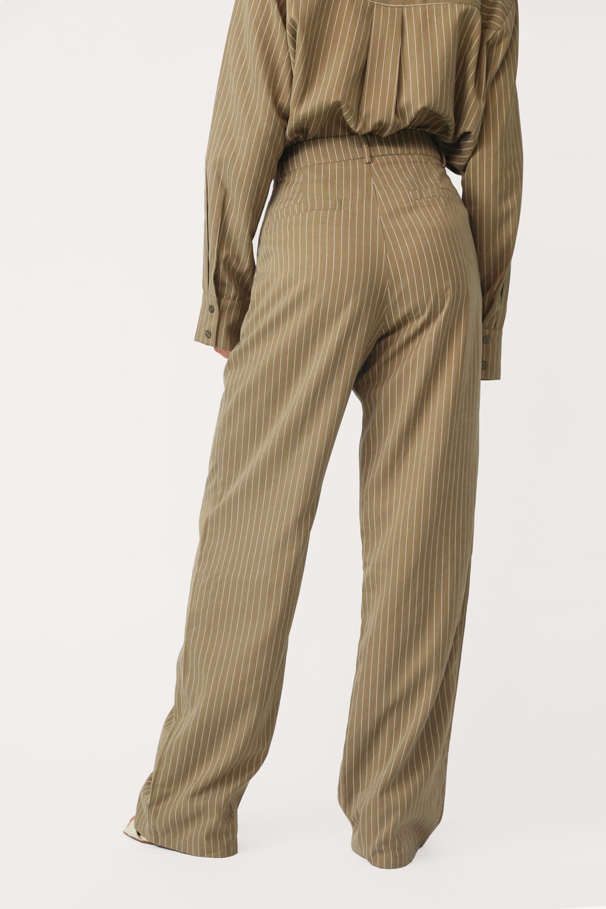 Model wearing the Midtown Babe Pinstripe Pant.