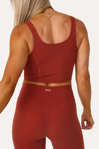 Model wearing the Sweat With Me Active longline bra-tank.