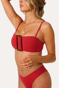 Model wearing the Roma Bandeau Buckle Bikini Top