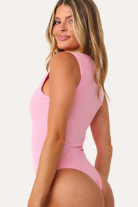Model wearing the Bubble Gum Pink basics tank bodysuit