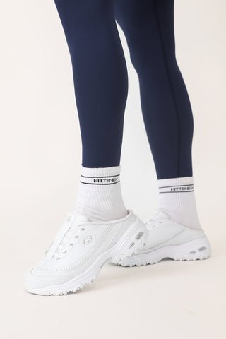 Model wearing Kittenish socks.
