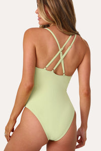 Model wearing the Sunshine Lime Asymmetrical One Piece.