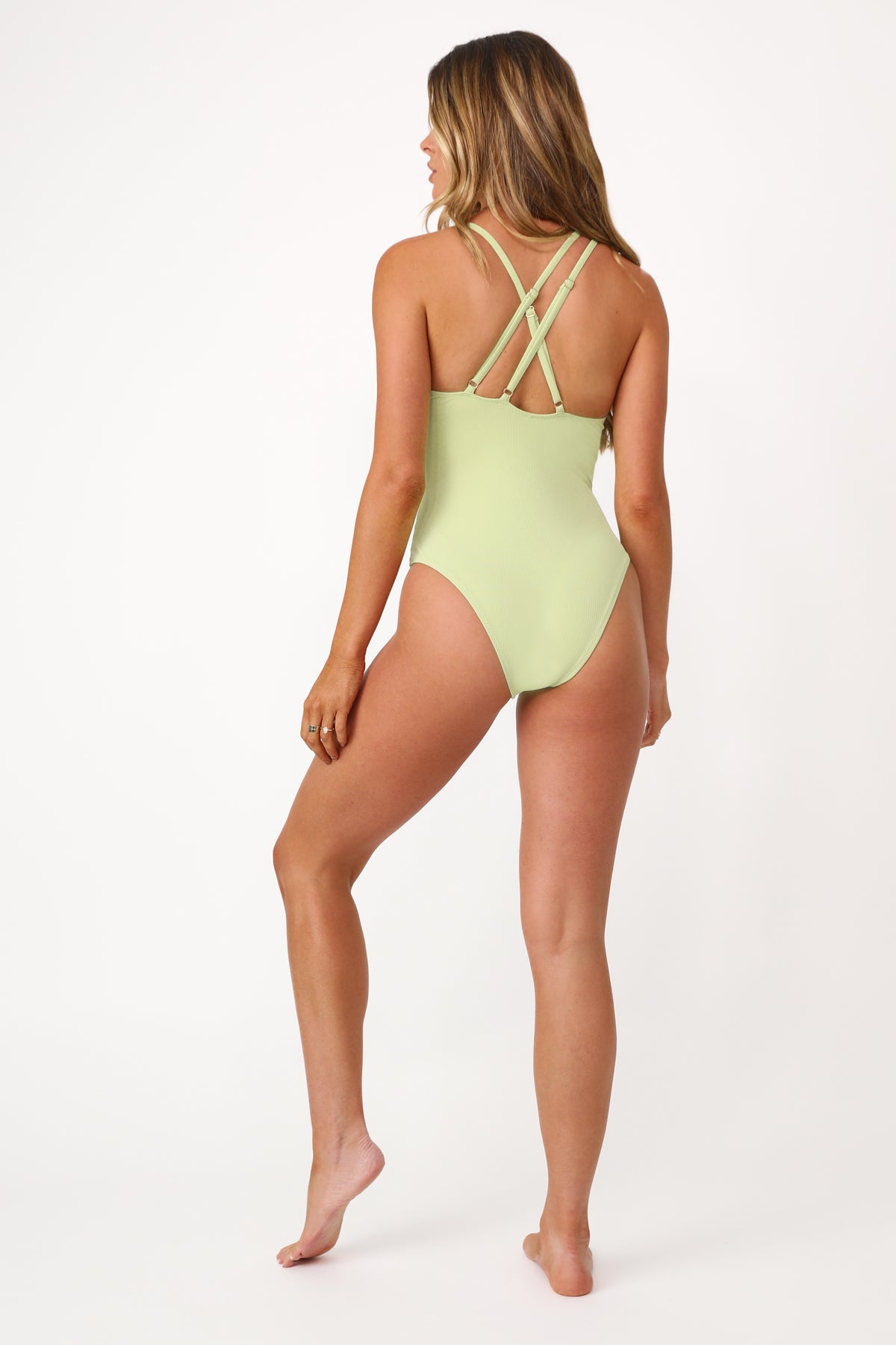 Model wearing the Sunshine Lime Asymmetrical One Piece.